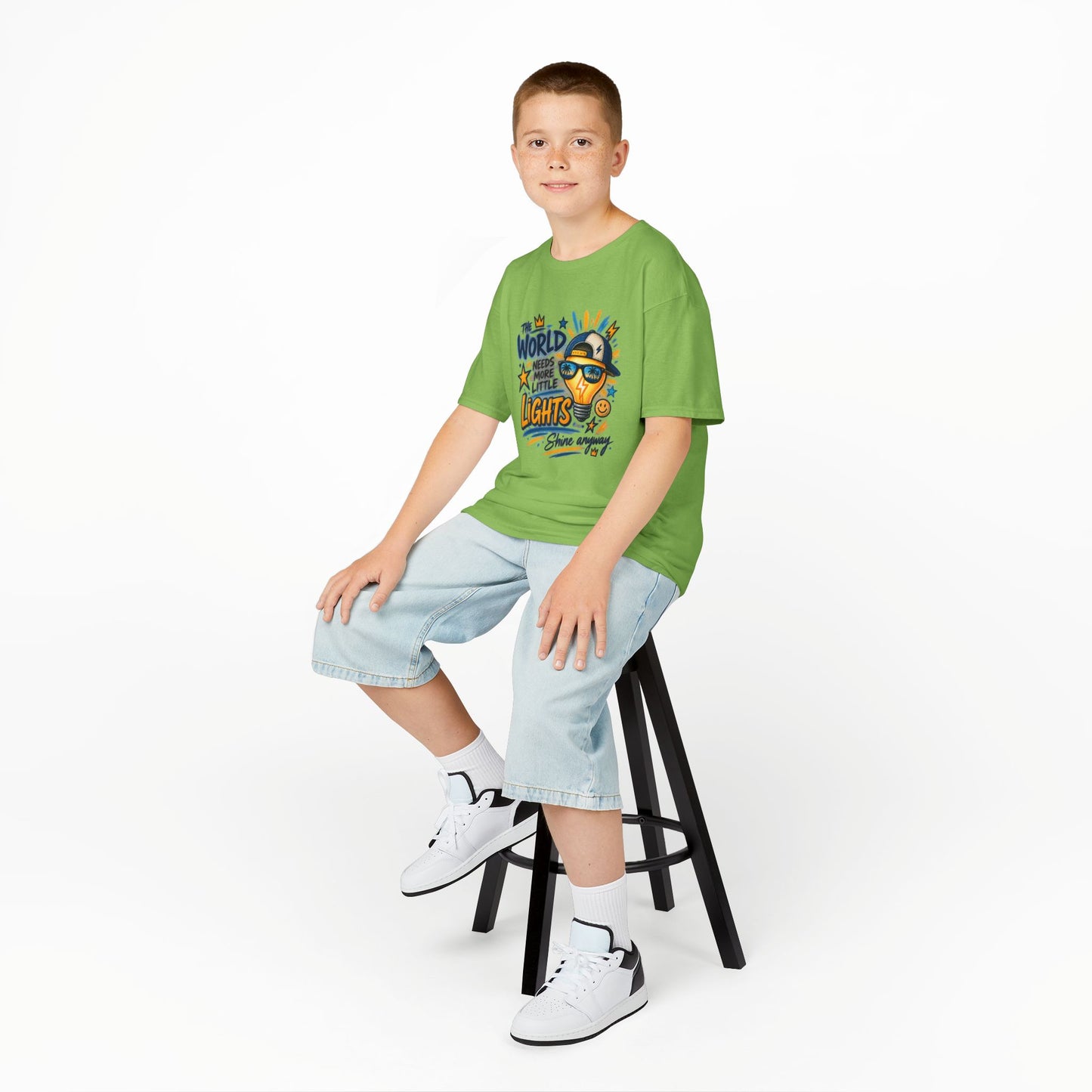 Kids T‑Shirt — "The World Needs More Little Lights" Cute Sunglasses Lightbulb Graphic