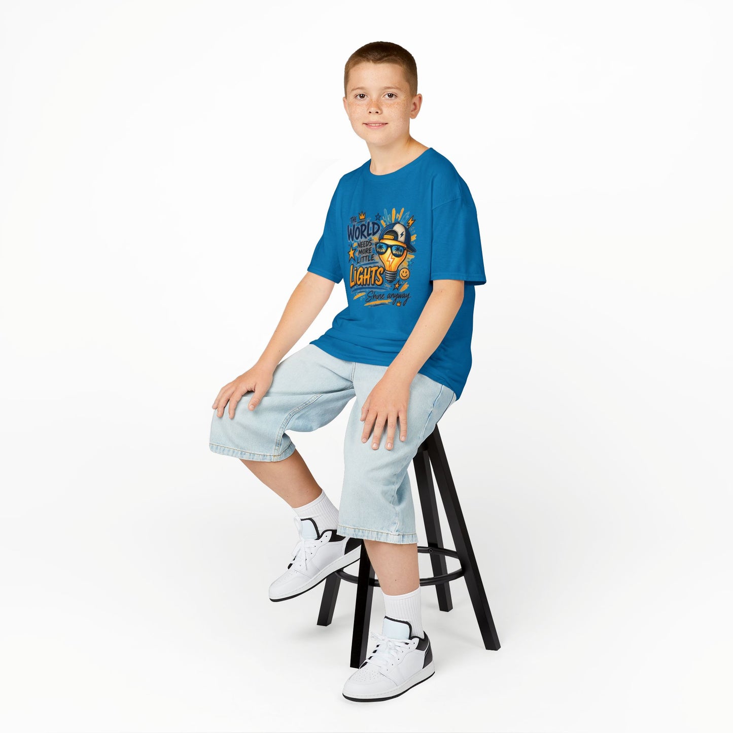 Kids T‑Shirt — "The World Needs More Little Lights" Cute Sunglasses Lightbulb Graphic